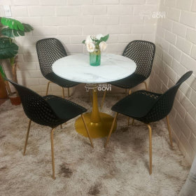 Comedor Médanos: Mesa Tulip Gold + Sillas Panali