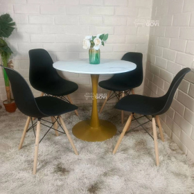 Comedor Unare: Mesa Tulip Gold + Sillas Eames