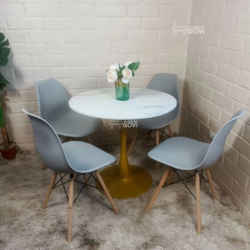 Comedor Unare: Mesa Tulip Gold + Sillas Eames